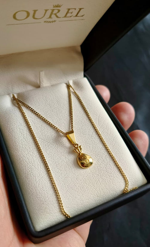 Cadena Cubana 65CM y dije Bolsa de Oro Laminado 18K